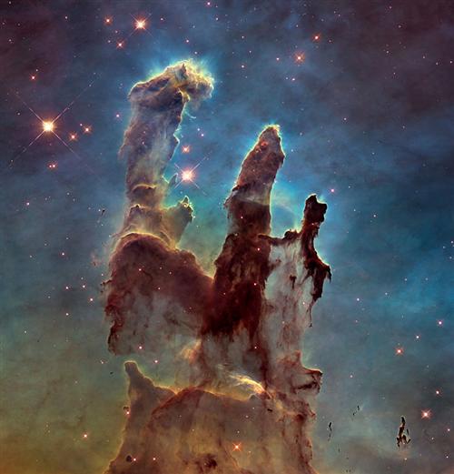"Pillars of Creation" is a photograph taken by the Hubble Space Telescope of elephant trunks of interstellar gas and dust in  